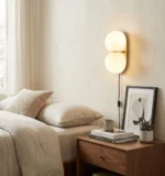Two Globe Glass Plug-in Wall Sconce - Image 2