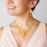 YEEZII 56 Pcs Gold Jewelry Set for Women with 5Pcs Layered Necklace, 5Pcs Layered Necklace, 12 Bracelets, 4 Hoop Earrings, 8 Stackable Rings, 10 hairpins, 12 Studs Earrings Jewerly set for Women